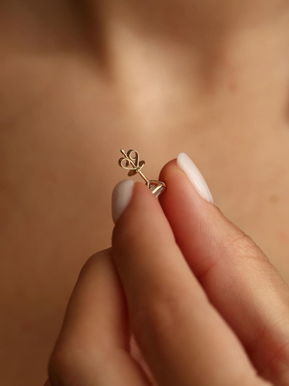 Emerald Cut Stud Earrings finger view close detail