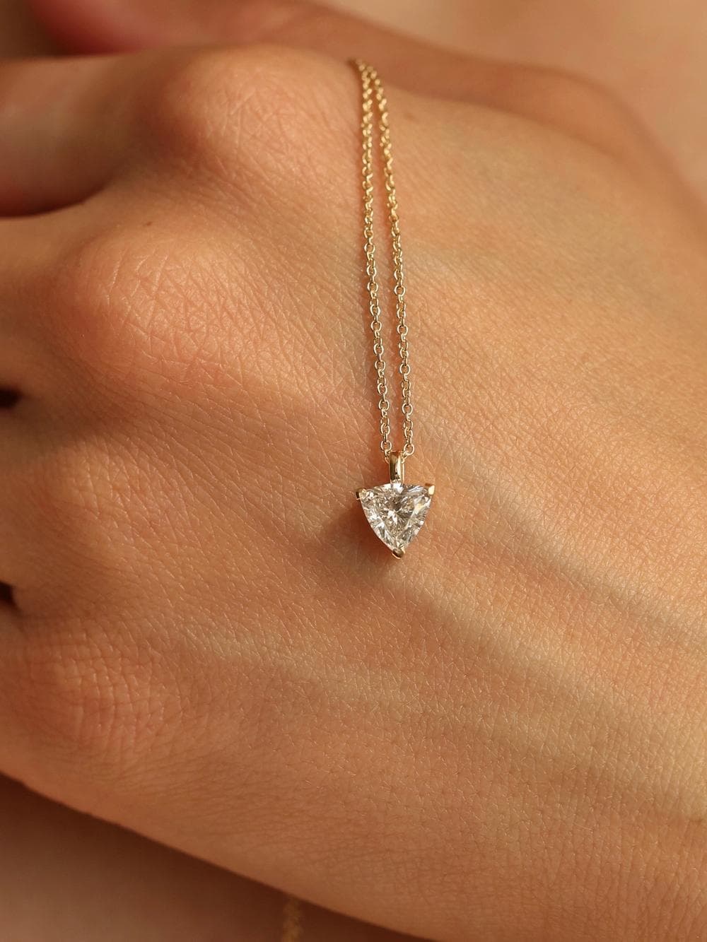 Trillion Cut Pendant hand detail