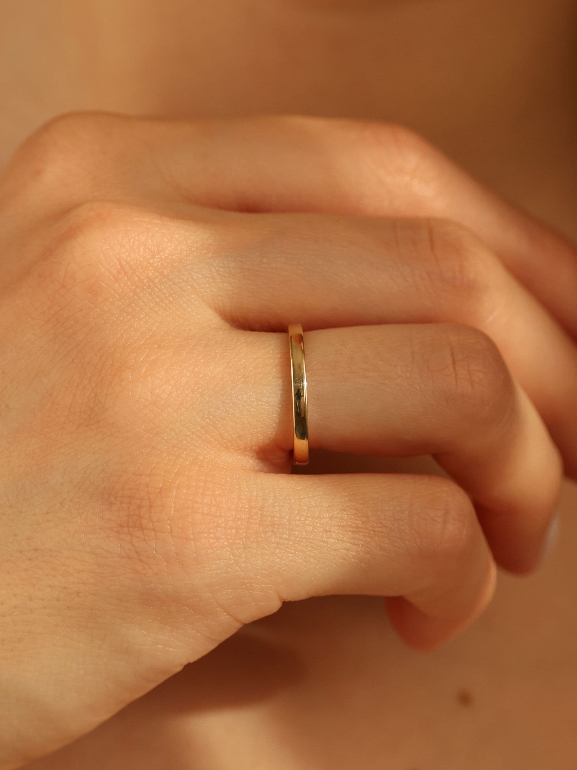 Classic 2mm Wedding Ring with hand